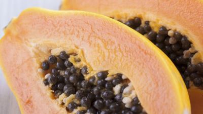 There is a papaya in this photo. 