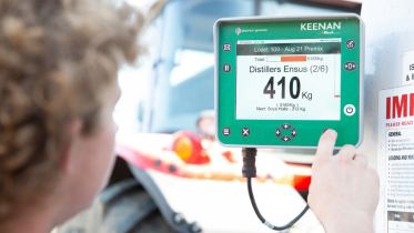 Farmer using KEENAN Controller